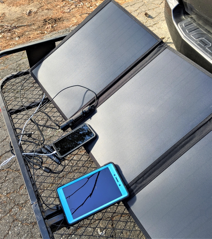 panels charging phones and olight light