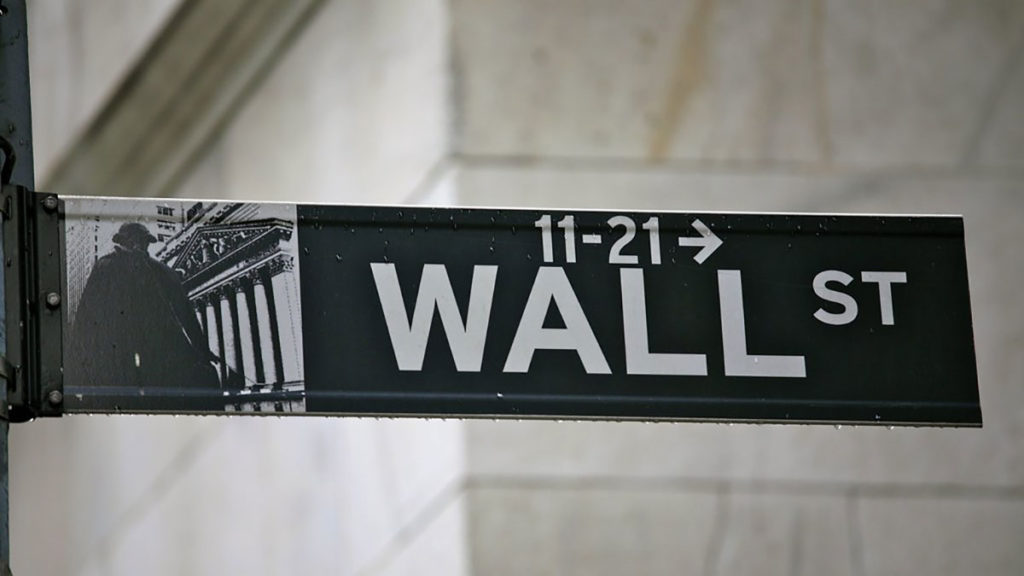 how to survive an economic collapse wall street sign