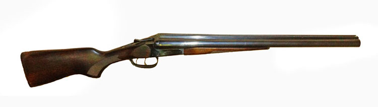 an old double barreled shotgun