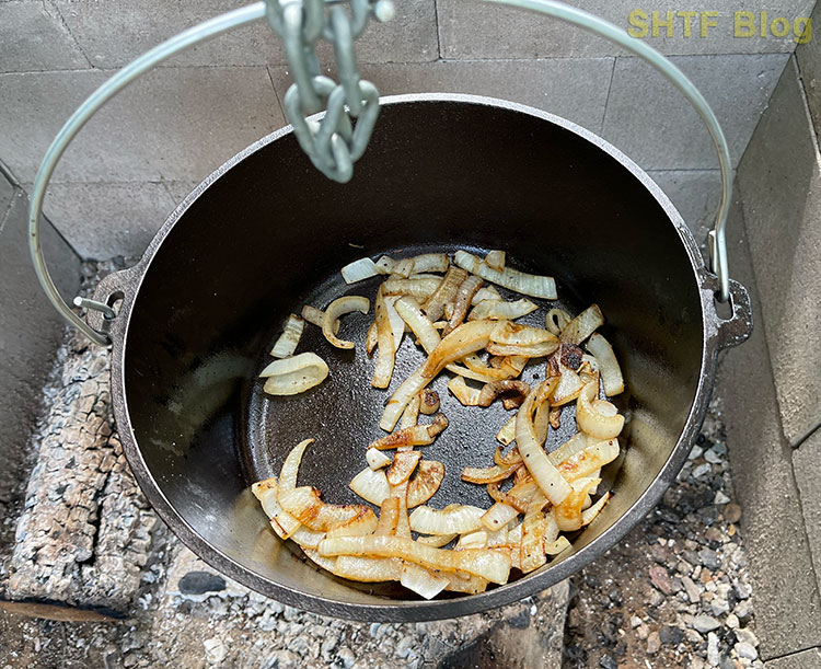 deep Dutch oven with onions inside